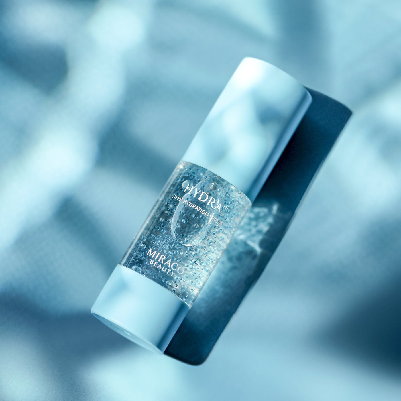 Hydra+ Deep Hydration Serum in blue background